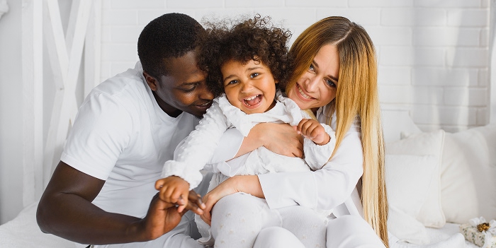 Smiling multiracial family