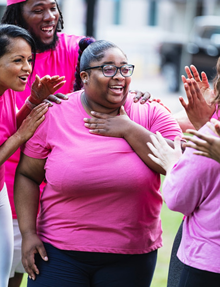 Woman in a breast cancer walk event