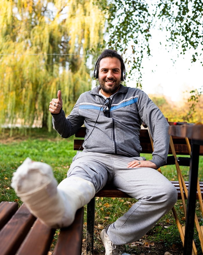 Man with a leg cast