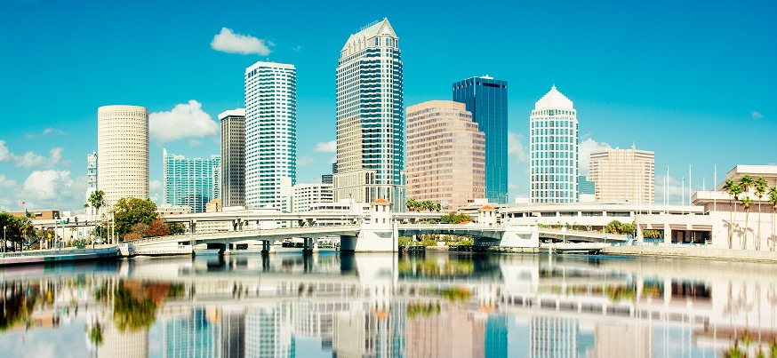 Traffic crossing the Howard Frankland Bridge into Tampa at sunset