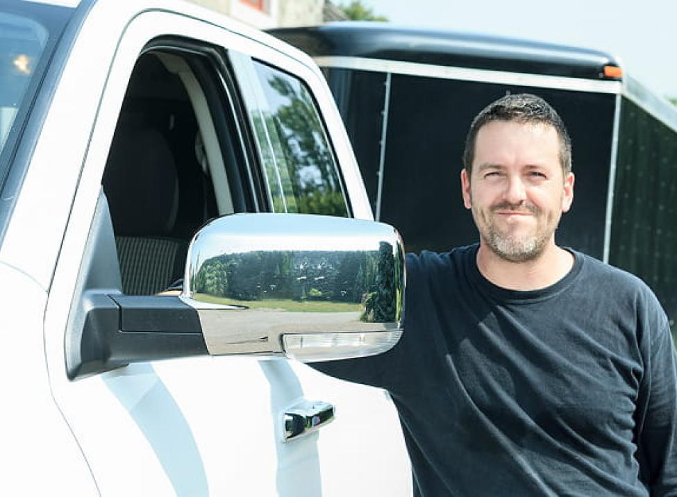 Small business owner with his truck and attached trailer